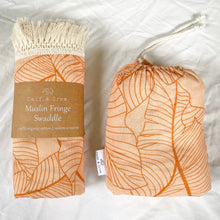 Load image into Gallery viewer, muslin fringe swaddle and organic cotton cot sheet in palm leaf print

