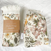 Load image into Gallery viewer, muslin fringe swaddle and organic cotton cot sheet in secret garden print
