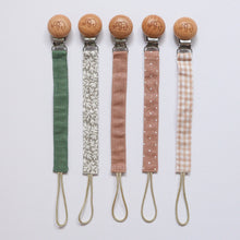 Load image into Gallery viewer, Five cotton dummy clips in different colours including pine, ivy, dusty rose, doty dusty rose, gingham