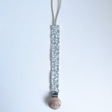 Load image into Gallery viewer, cotton dummy clip in ivy colour with a elephant logo on the wooden clip