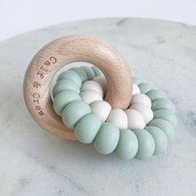Load image into Gallery viewer, wooden ring with calf & crew logo around a double silicone ring in mint colour