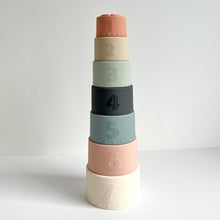 Load image into Gallery viewer, the pastel silicone cups stacked in a tower showing their numbered sides