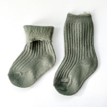 Load image into Gallery viewer, a pair of crew cosy socks in khaki with one folded to show fluffy inside