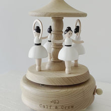 Load and play video in Gallery viewer, a wooden musical carousel with four dancing ballerinas spinning and playing music
