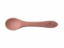 Load image into Gallery viewer, the silicone spoon in rust colour showing the Calf &amp; Crew logo on the handle

