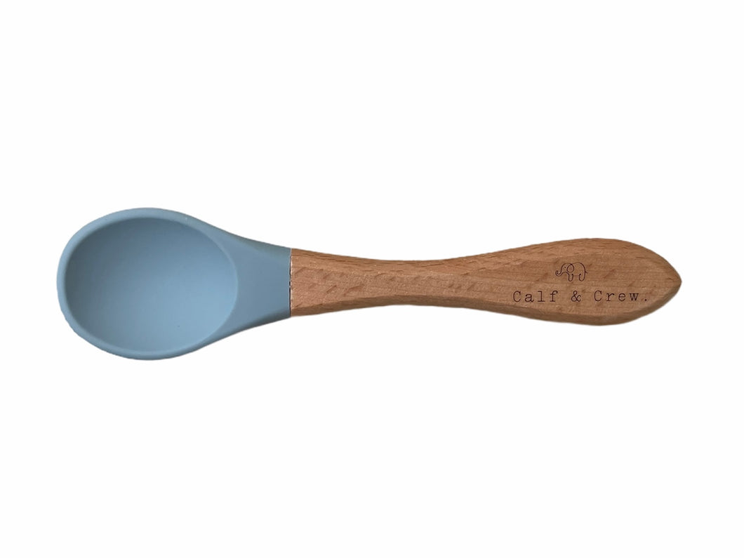 beechwood spoon with baby blue silicone tip and engraved Calf & Crew logo
