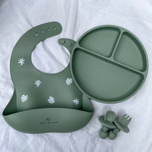 Load image into Gallery viewer, a silicone bib with a leaf print, suction divider plate and a easy grip spoon and fork in sage colour

