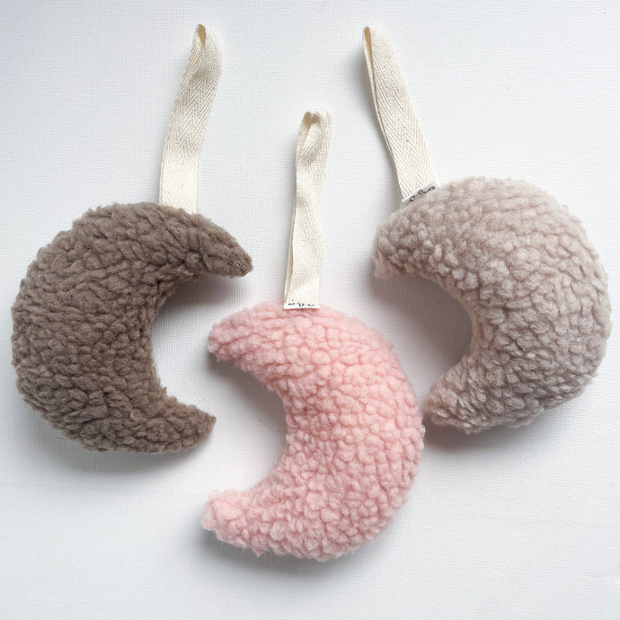 three teddy moon comfort dummy holders in mocha, baby pink and chai colours