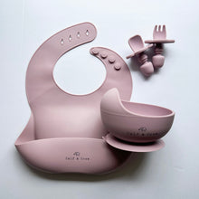 Load image into Gallery viewer, Silicone bib, silicone suction bowl, and easy grip spoon and fork in rose colour 
