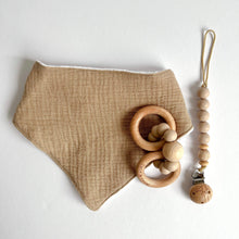 Load image into Gallery viewer, Latte coloured muslin bib with wooden silicone ring teether and silicone dummy clip in chai colour
