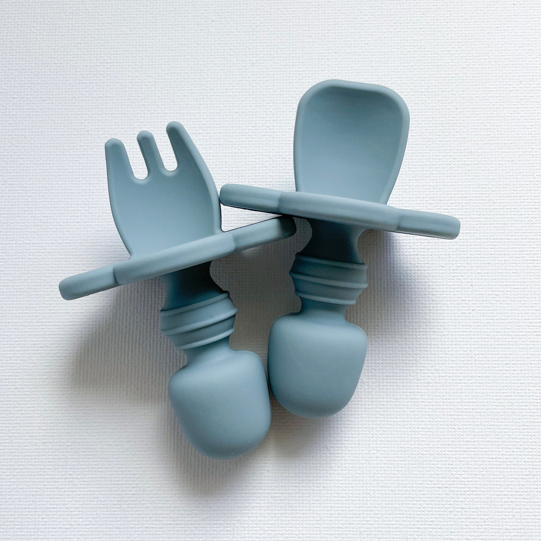 small round easy grip spoon and fork in baby blue colour