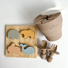 Load image into Gallery viewer, The silicone animal puzzle with the collapsible snack cup and easy grip spoon and fork in latte colour
