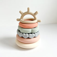 Load image into Gallery viewer, the pastel sunrise silicone rings stacked together
