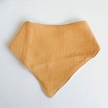 Load image into Gallery viewer, the front of the muslin towel dribble bib in tangerine colour
