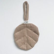 Load image into Gallery viewer, inen leaf dummy holder in fawn colour showing elephant logo tag
