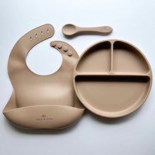 Load image into Gallery viewer, a silicone bib, suction divider plate and a silicone spoon in latte colour
