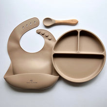 Load image into Gallery viewer, a silicone bib, suction divider plate and a beechwood spoon in latte colour
