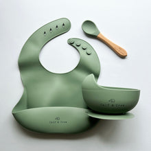 Load image into Gallery viewer, Silicone bib, silicone suction bowl, and beechwood spoon in sage colour all with the Calf &amp; Crew logo
