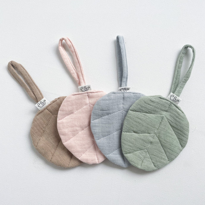 4 linen leaf dummy holders in fawn, baby pink, sky blue and sage colours