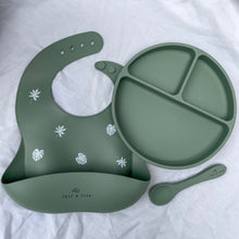 Load image into Gallery viewer, a silicone bib with a leaf print, suction divider plate and a silicone spoon in sage colour
