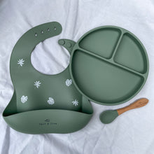 Load image into Gallery viewer, a silicone bib with a leaf print, suction divider plate and a beechwood spoon in sage colour
