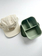 Load image into Gallery viewer, a crew cap in cream with a open silicone bento lunchbox in sage colour
