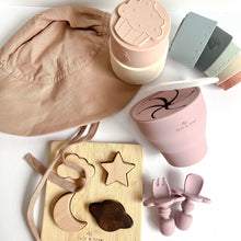 Load image into Gallery viewer, Floppy sun hat in rose colour with a collapsible snack cup and small easy grip spoon and fork with a wooden night sky puzzle
