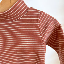 Load image into Gallery viewer, a close of the neckline and shoulder of the thick long sleeve skivvy in maroon stripe
