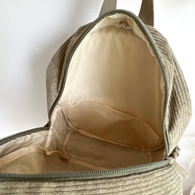 Load image into Gallery viewer, khaki backpack zipped open showing cream lining
