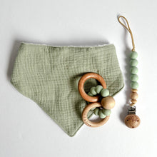 Load image into Gallery viewer, Sage muslin bib with a wooden silicone ring teether and silicone dummy clip in mint
