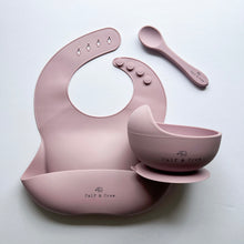 Load image into Gallery viewer, Silicone bib, silicone suction bowl, and silicone spoon in rose colour all with the Calf &amp; Crew logo
