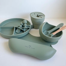 Load image into Gallery viewer, a suction bowl, a bib, a silicone spoon, a beechwood spoon, a collapsible snack cup, a suction divider plate, and easy grip cutlery all in sage silicone colour
