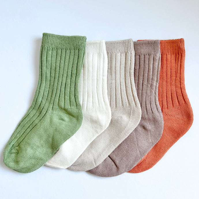 the crew socks in five colours, apple, ivory, latte, mocha, and burnt orange