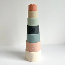 Load image into Gallery viewer, the pastel silicone cups stacked in a tower showing their numbered sides
