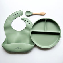 Load image into Gallery viewer, a silicone bib, suction divider plate and a beechwood spoon in sage colour
