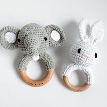 Load image into Gallery viewer, grey crochet elephant rattle toy next to a white crochet bunny rattle toy

