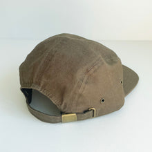 Load image into Gallery viewer, the back of the crew cap patch in camo showing the adjustable strap
