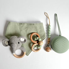 Load image into Gallery viewer, Sage coloured muslin bib with grey crochet elephant rattle, wooden silicone ring teether, silicone dummy clip in mint colour and soother case in sage colour
