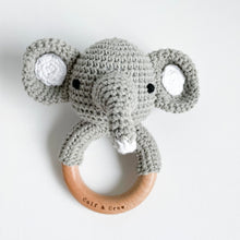 Load image into Gallery viewer, grey crochet elephant rattle on a wooden ring
