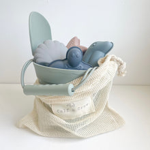 Load image into Gallery viewer, the silicone beach toy set in palm breeze colour inside the cotton net bag

