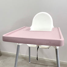 Load image into Gallery viewer, a rose silicone high chair table cover on a white ikea highchair
