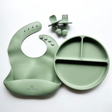 Load image into Gallery viewer, a silicone bib, suction divider plate and a easy grip spoon and fork in sage colour
