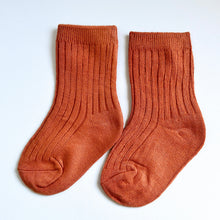 Load image into Gallery viewer, pair of ribbed crew socks in burnt orange
